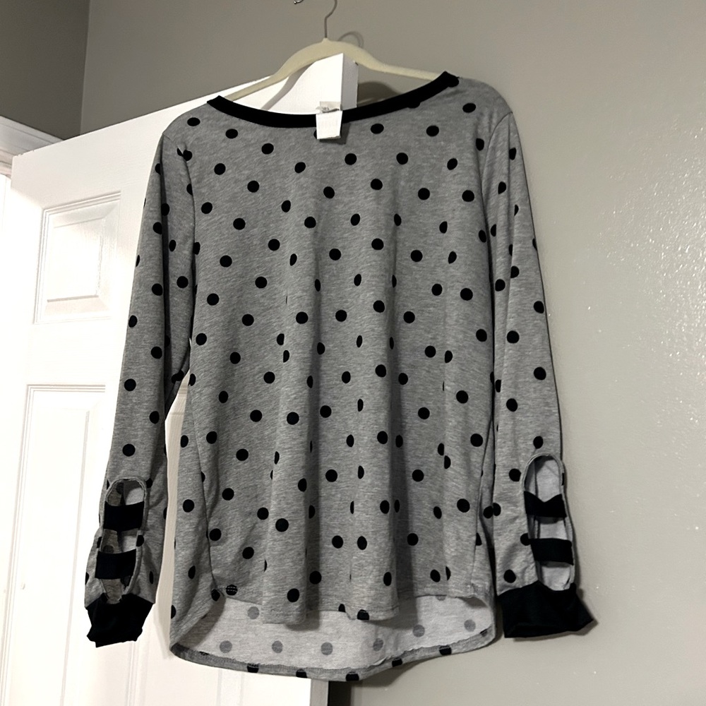 Sew in love sized large polka dots top with a bold ladder detail on the forearm